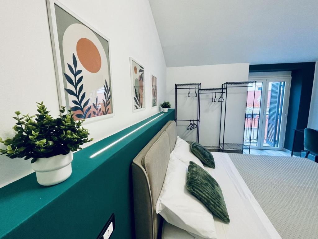 Postel nebo postele na pokoji v ubytování Nautilus B&B