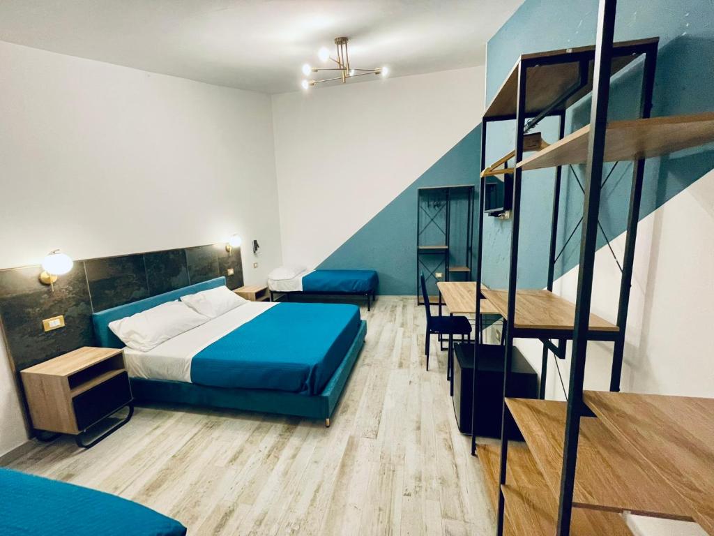 Postel nebo postele na pokoji v ubytování Nautilus B&B