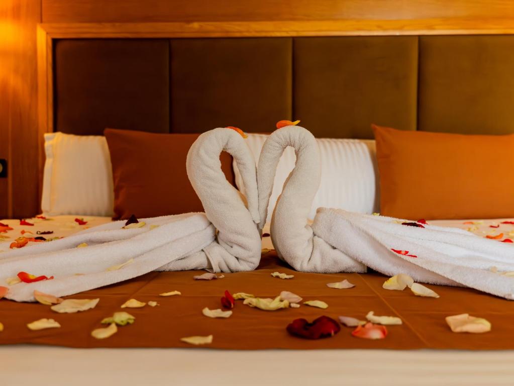 Postel nebo postele na pokoji v ubytování Hotel LA PALOMA