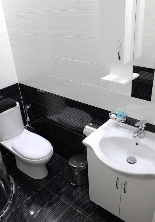 Koupelna v ubytování KorcaSmileHotel