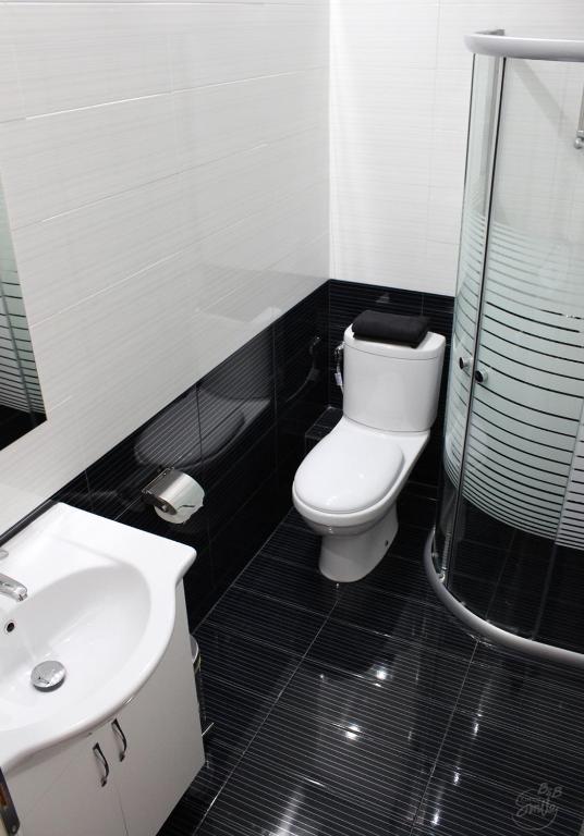 Koupelna v ubytování KorcaSmileHotel