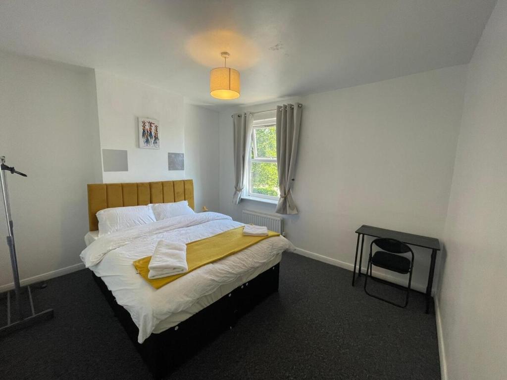 Кровать или кровати в номере Cosy home in the City Centre