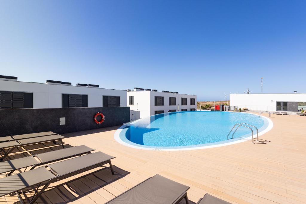 Bazén v ubytování Moderno apartamento cerca del mar en Tenerife nebo v jeho okolí