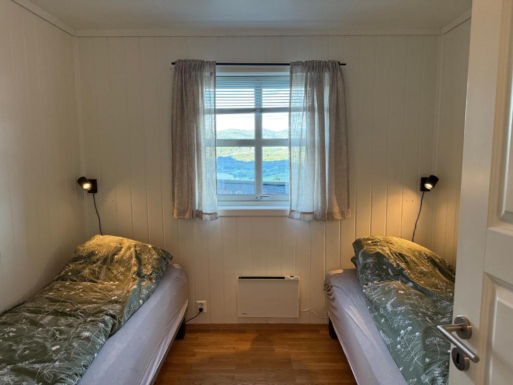 Ένα ή περισσότερα κρεβάτια σε δωμάτιο στο Apartment with a view at Bavallen Tråstølen Voss