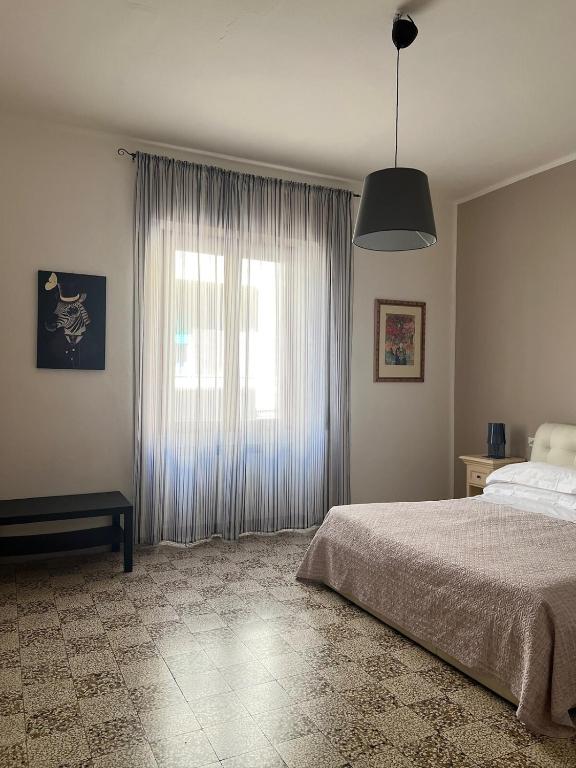Postel nebo postele na pokoji v ubytování Aquadro Casa Vacanze