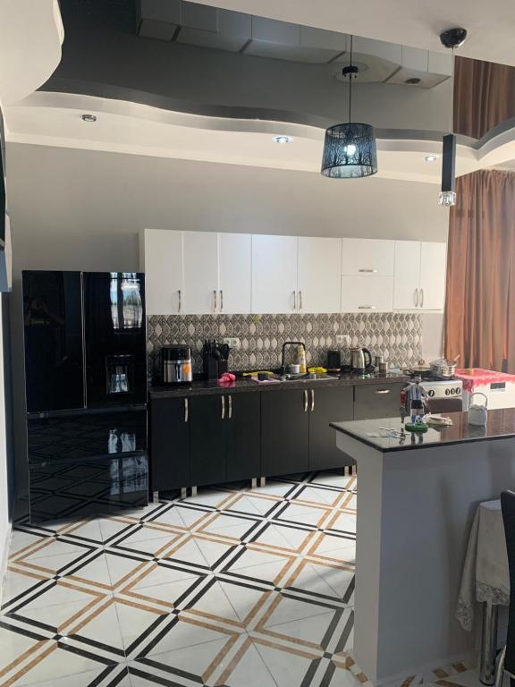 Kuchyň nebo kuchyňský kout v ubytování Guest House Kakha