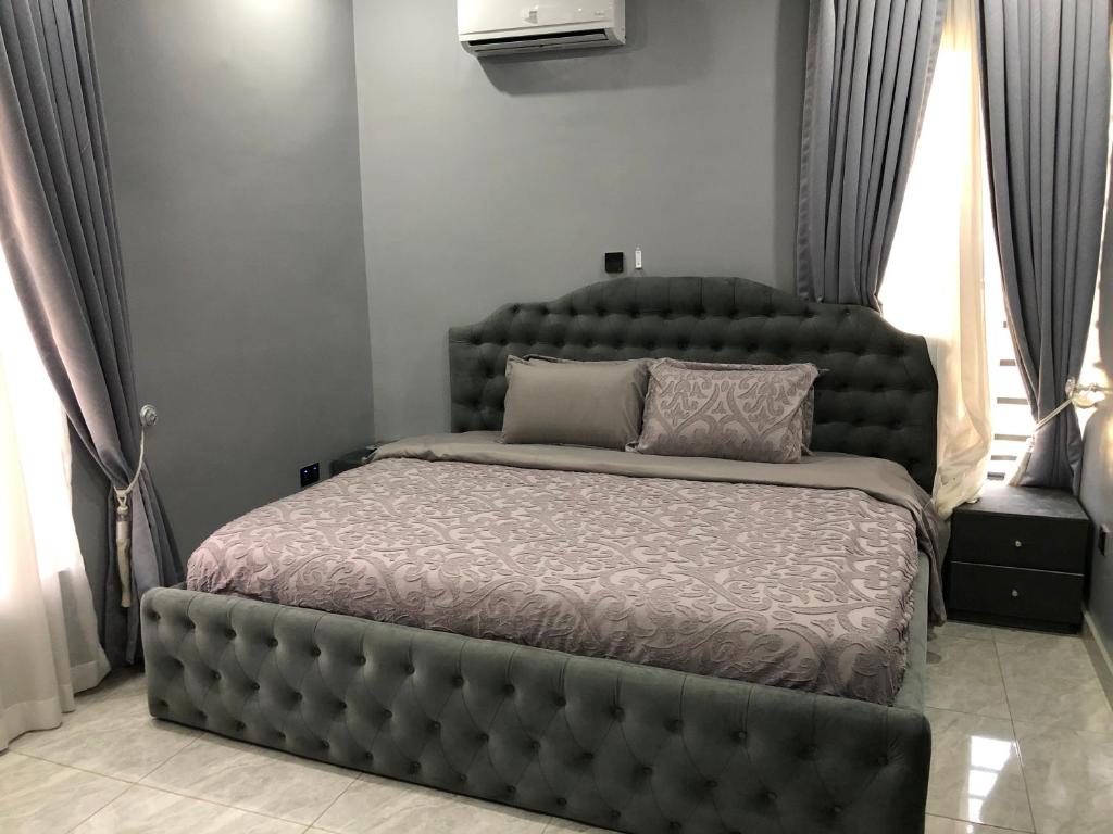 Postel nebo postele na pokoji v ubytování Circle staycation