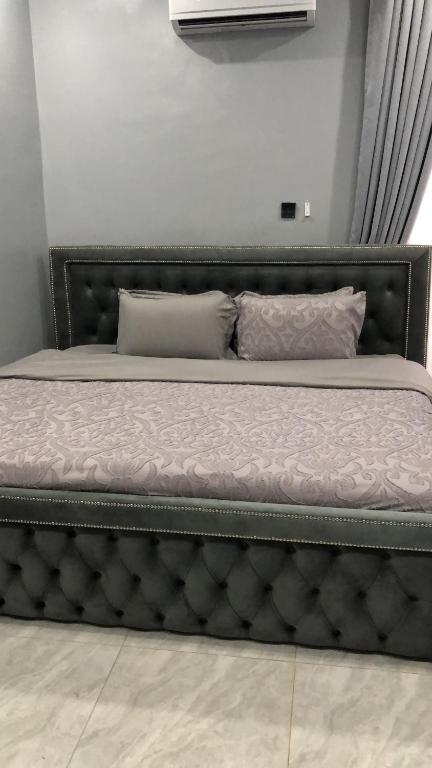 Postel nebo postele na pokoji v ubytování Circle staycation