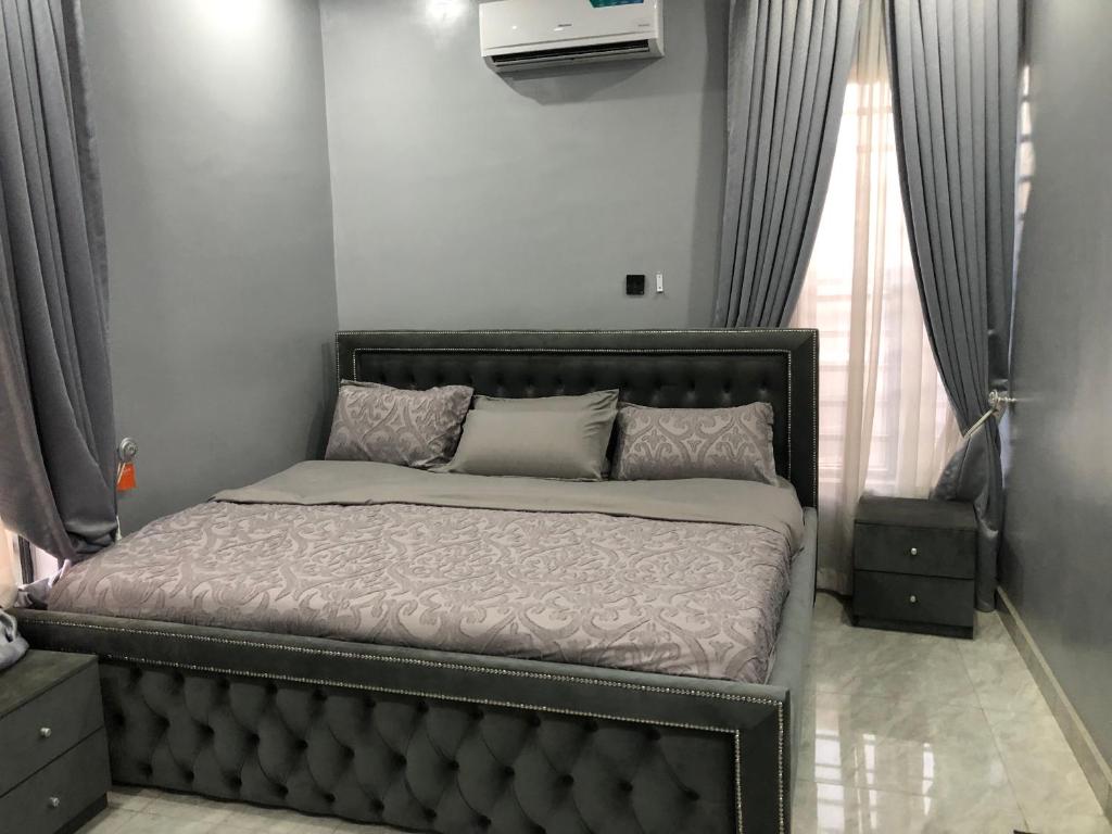 Postel nebo postele na pokoji v ubytování Circle staycation