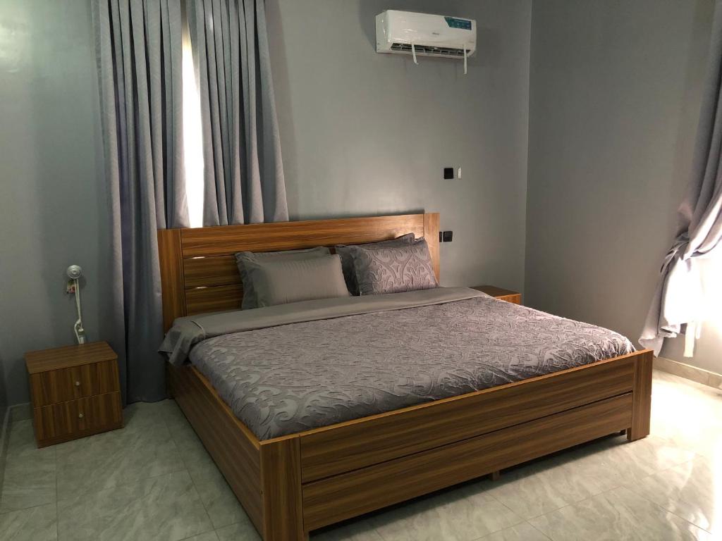 Postel nebo postele na pokoji v ubytování Circle staycation