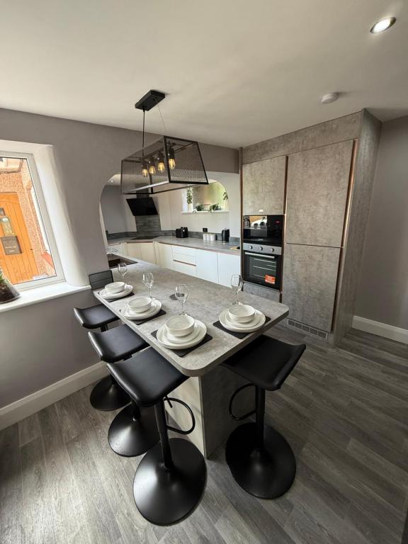Η κουζίνα ή μικρή κουζίνα στο Modern 2 Bedroom Private Detached Cottage