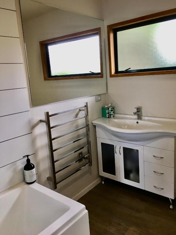 Postel nebo postele na pokoji v ubytování 90 Mile Paradise Ahipara
