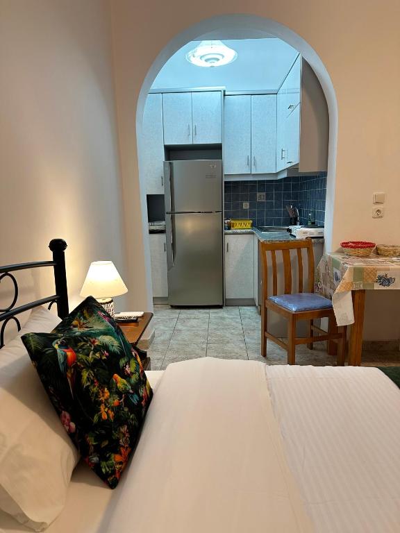 Kuchyň nebo kuchyňský kout v ubytování Green Parrot Apartments