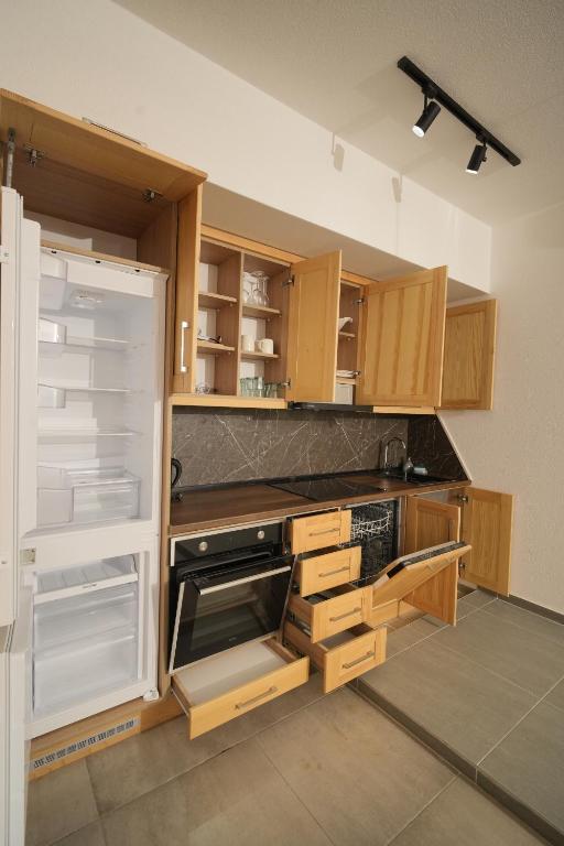 Kuchyň nebo kuchyňský kout v ubytování Suites Castello