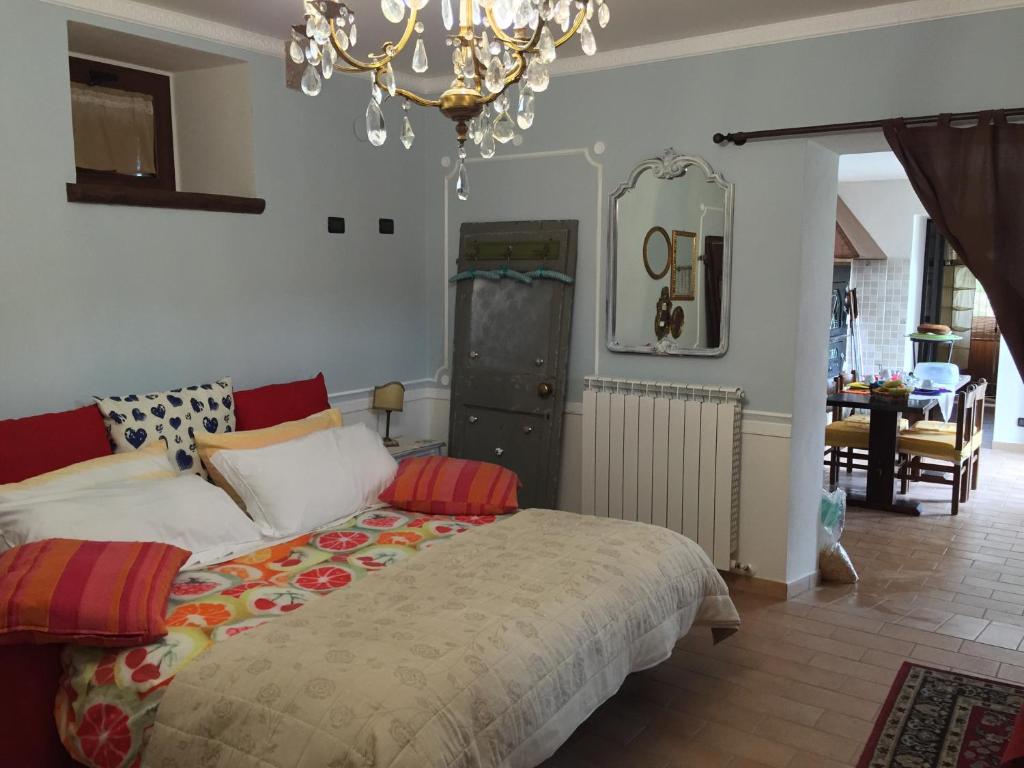 Postel nebo postele na pokoji v ubytování Agriturismo Cailuca