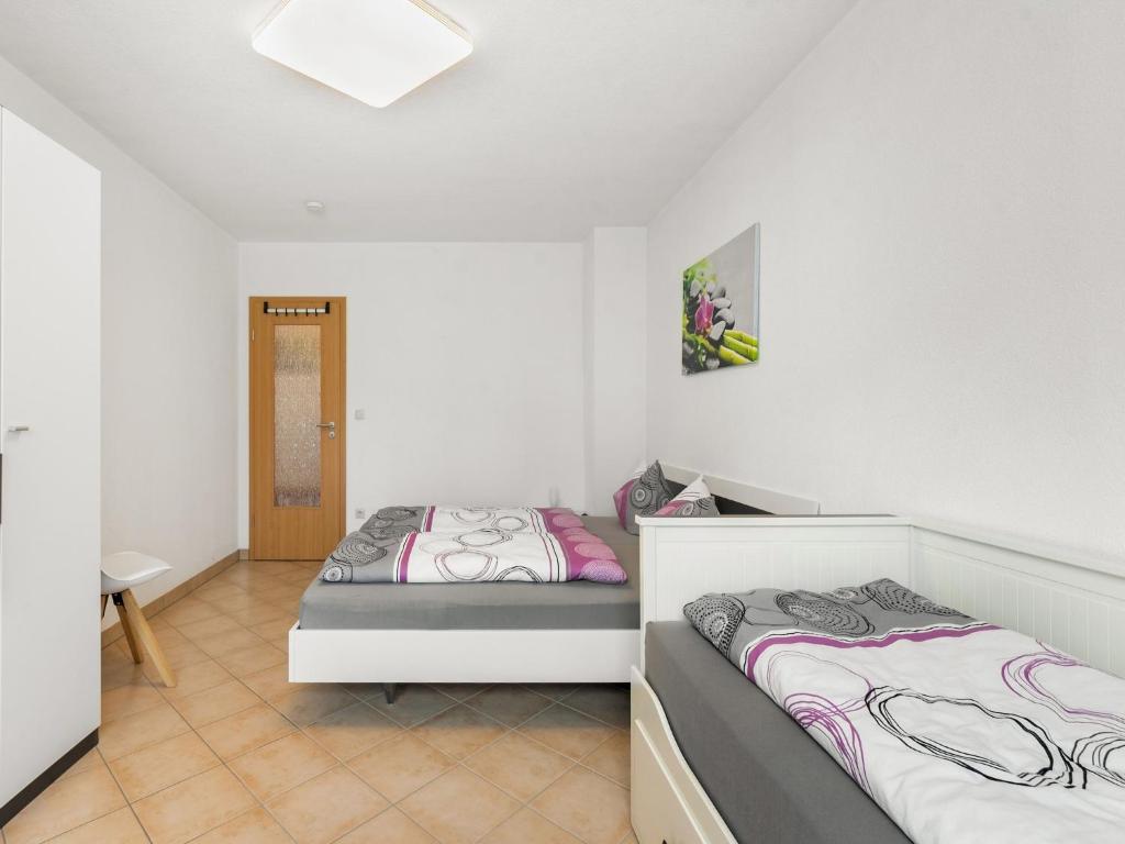 Postel nebo postele na pokoji v ubytování Modern apartment in Sebnitz with a terrace in Sebnitz