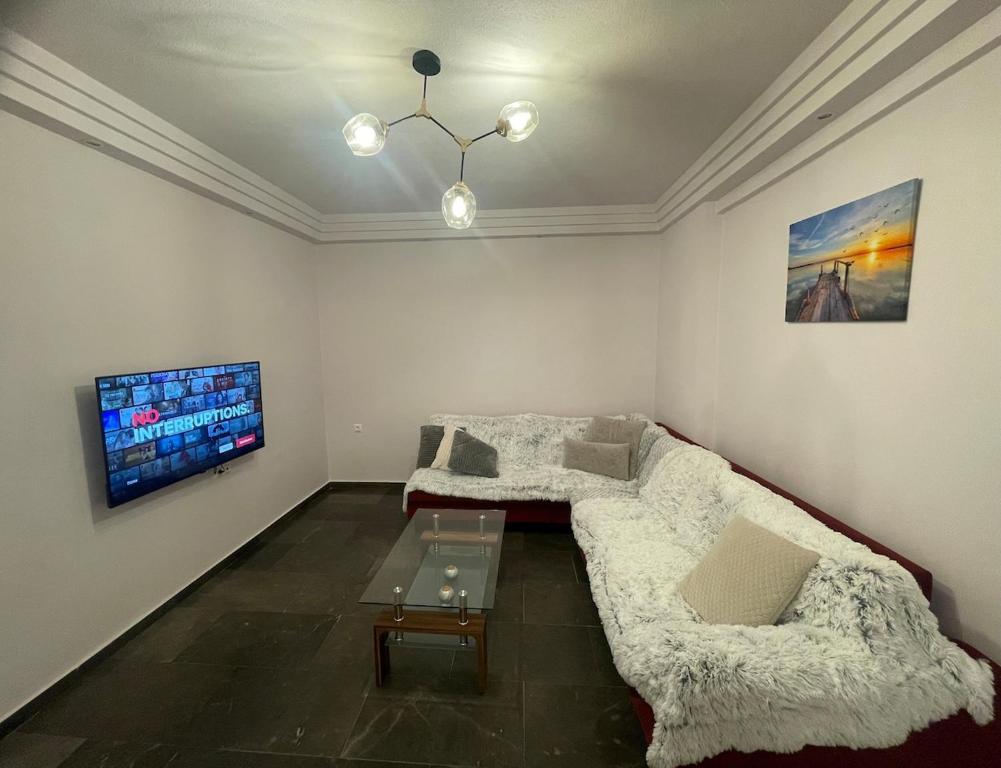 TV a/nebo společenská místnost v ubytování Iris Central Home