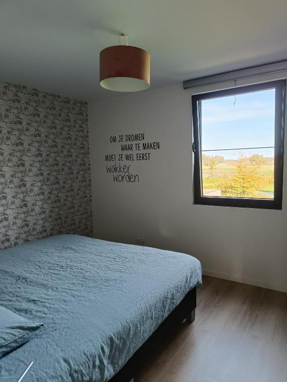 Postel nebo postele na pokoji v ubytování HYTTA