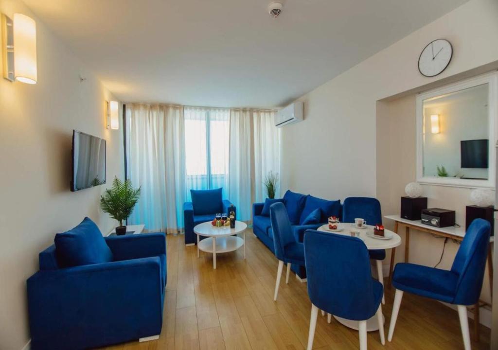 Posezení v ubytování New Orbi City Suite