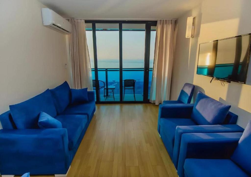 Posezení v ubytování New Orbi City Suite