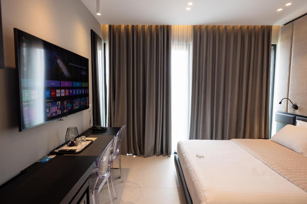 TV a/nebo společenská místnost v ubytování Hotel Majestic