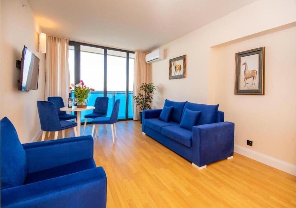 Posezení v ubytování New Orbi City Suite