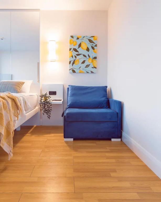 Postel nebo postele na pokoji v ubytování New Orbi City Suite