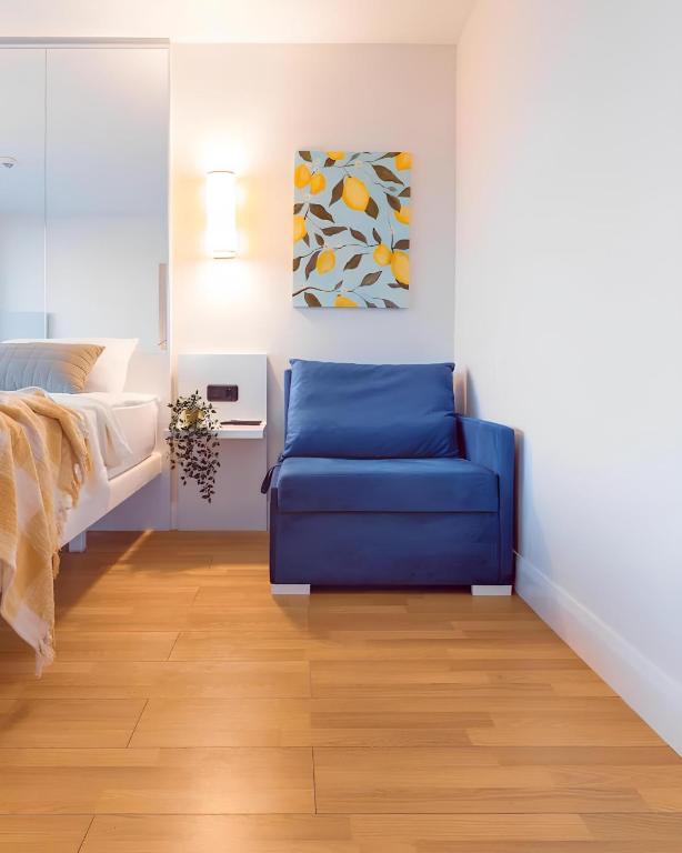Postel nebo postele na pokoji v ubytování New Orbi City Suite