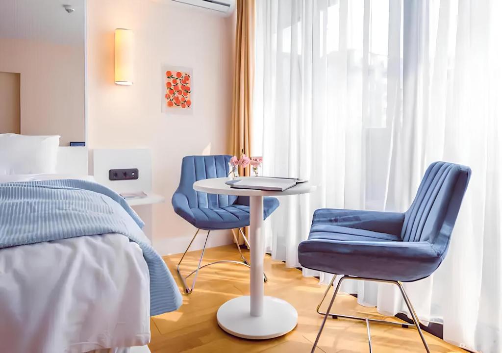 Posezení v ubytování New Orbi City Suite