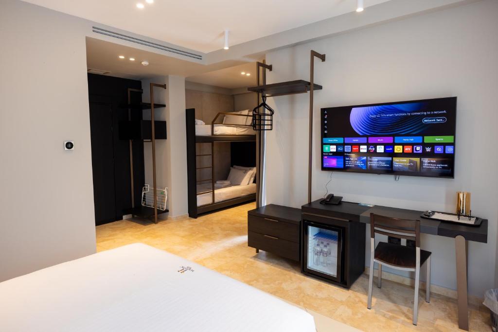 TV a/nebo společenská místnost v ubytování Hotel Majestic