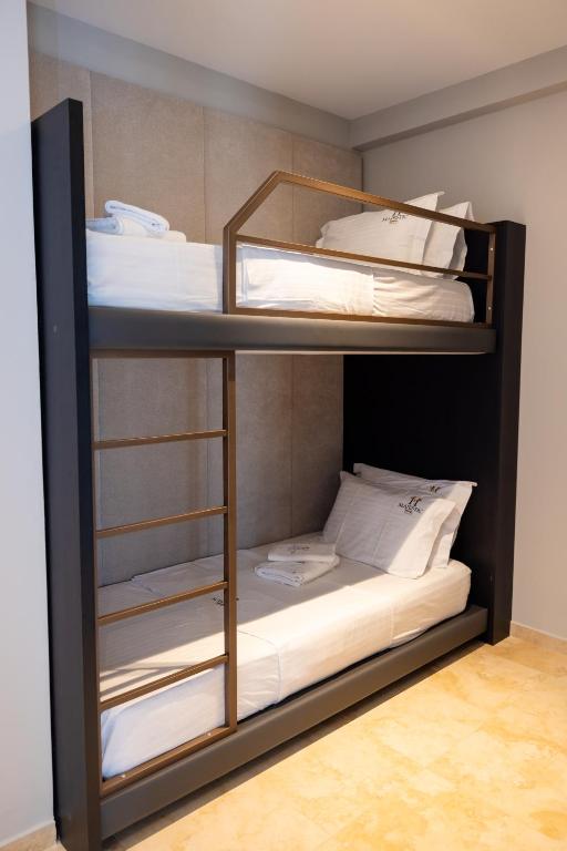 Postel nebo postele na pokoji v ubytování Hotel Majestic