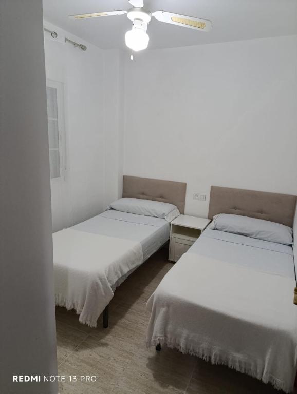 Posteľ alebo postele v izbe v ubytovaní Apartamento Residencial Puerta Roquetas