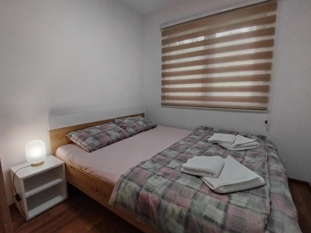 Postel nebo postele na pokoji v ubytování Vikendica Batin Konak