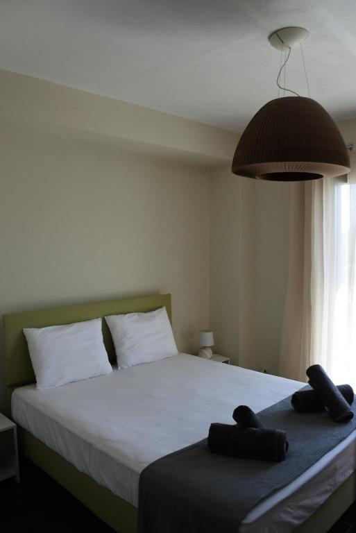 Postel nebo postele na pokoji v ubytování Villa Aggelos