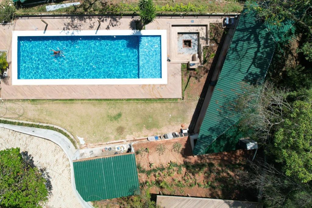 Πισίνα στο ή κοντά στο Pousada Pausa Urbana