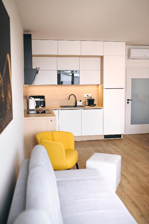 Kuchyň nebo kuchyňský kout v ubytování Apartmány DVĚ BOBULE 2KK