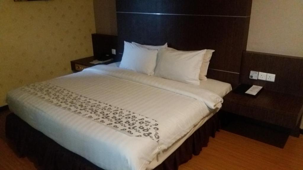 Postel nebo postele na pokoji v ubytování Penview Hotel