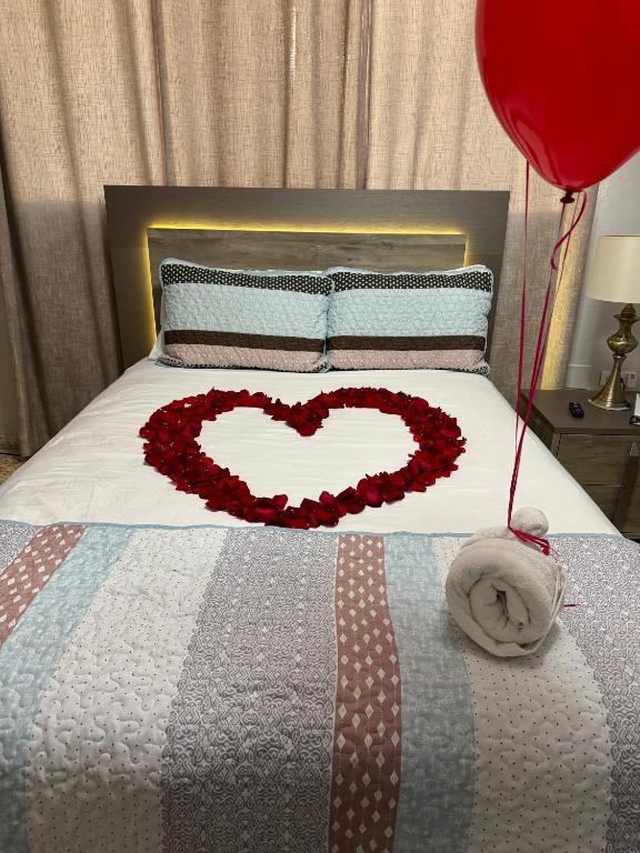 Postel nebo postele na pokoji v ubytování Itza-Bella Suites