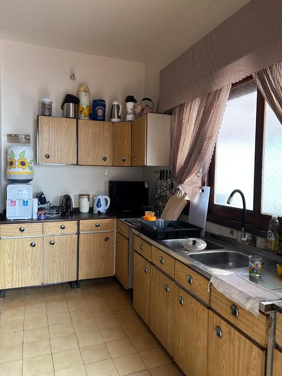 Kuchyň nebo kuchyňský kout v ubytování Frida Hostel