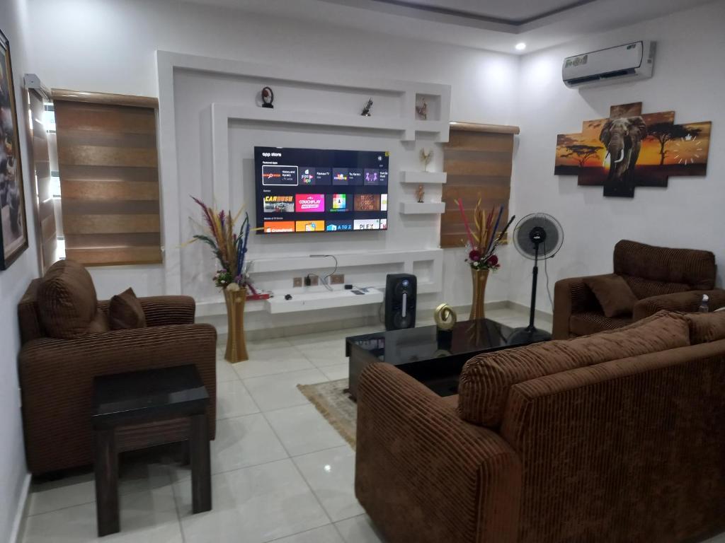 TV a/nebo společenská místnost v ubytování High five Apartment