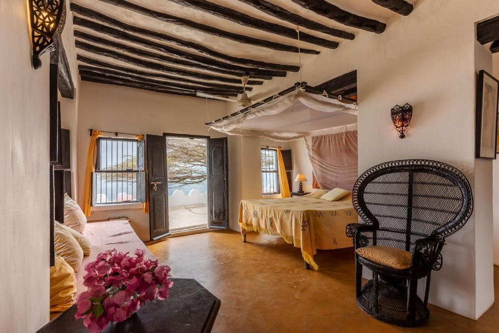 Postel nebo postele na pokoji v ubytování Marquezy House - Shela, Lamu Island
