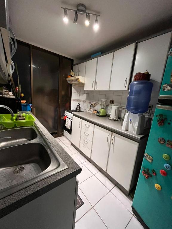 Kuchyň nebo kuchyňský kout v ubytování MYSTIC LODGING Habitaciones privadas con baño