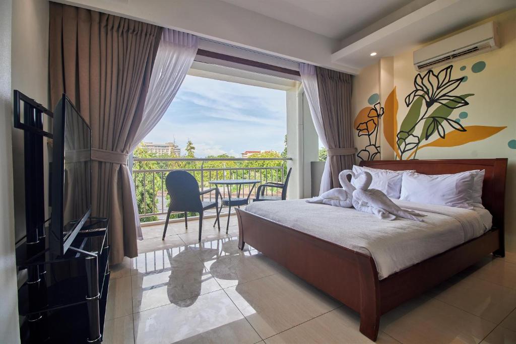 TV a/nebo společenská místnost v ubytování Mactan Resort by 1521