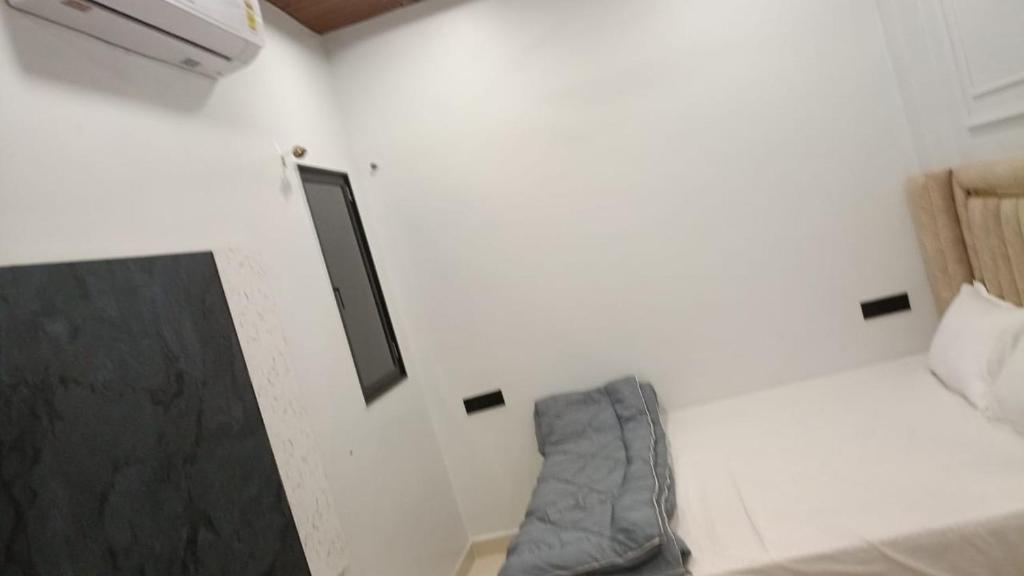 Postel nebo postele na pokoji v ubytování Cloud hotel