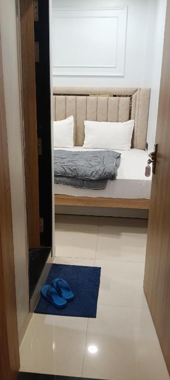 Postel nebo postele na pokoji v ubytování Cloud hotel