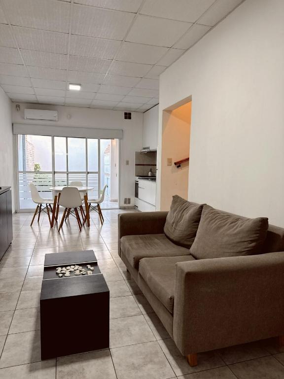 a living room with a couch and a table at Esperanza Apartment in Esperanza