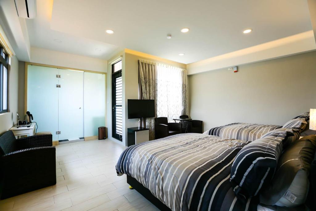 Postel nebo postele na pokoji v ubytování Sea People B&B