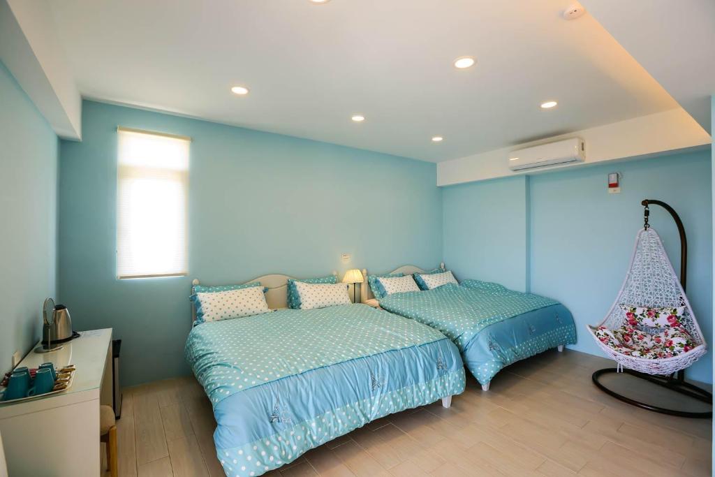 Postel nebo postele na pokoji v ubytování Sea People B&B
