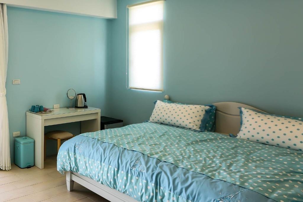 Postel nebo postele na pokoji v ubytování Sea People B&B