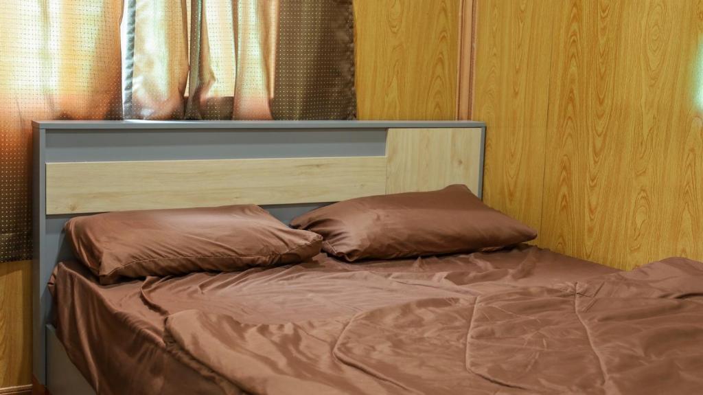 Postel nebo postele na pokoji v ubytování Baan Airport